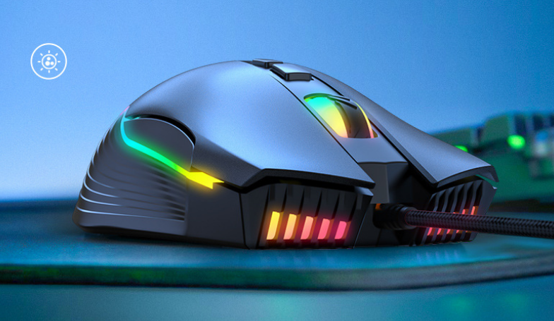 Black RGB wired gaming mouse on a desk surface